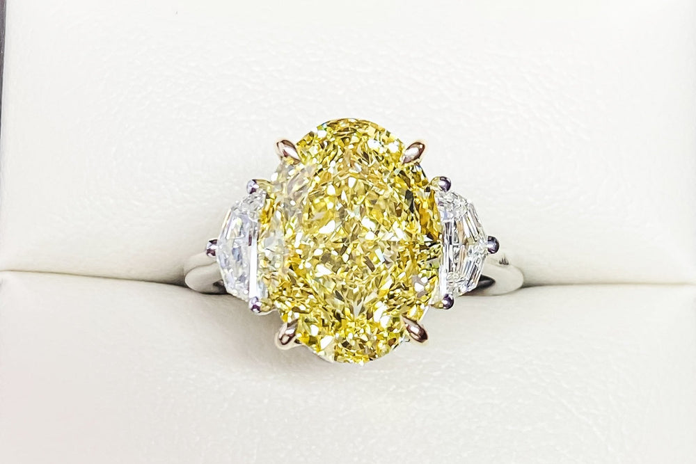 GIA Certified 7.00 Carat Oval Fancy Intense Yellow Diamond Ring