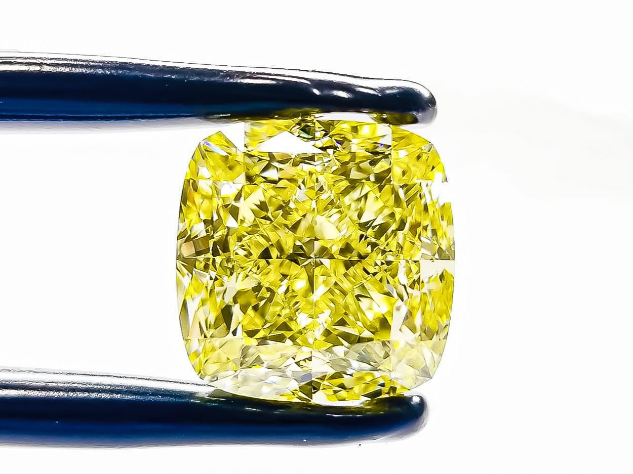 GIA Certified 16.00 Carat Fancy Intense Yellow Diamond