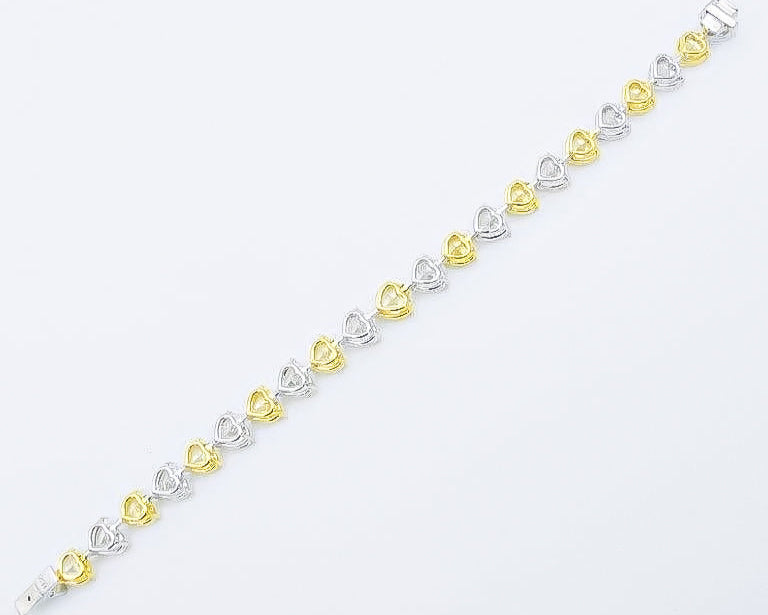 GIA Certified 23.00 Carat Heart Fancy Yellow Diamond Bracelet