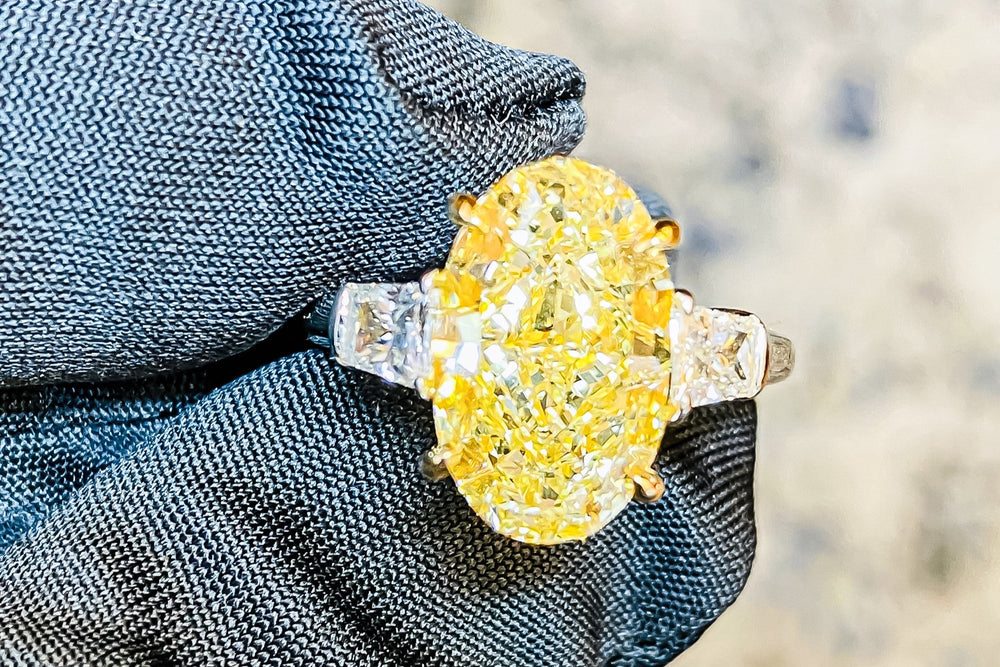 GIA Certified 5.75 Carat Oval Fancy Yellow Diamond Ring