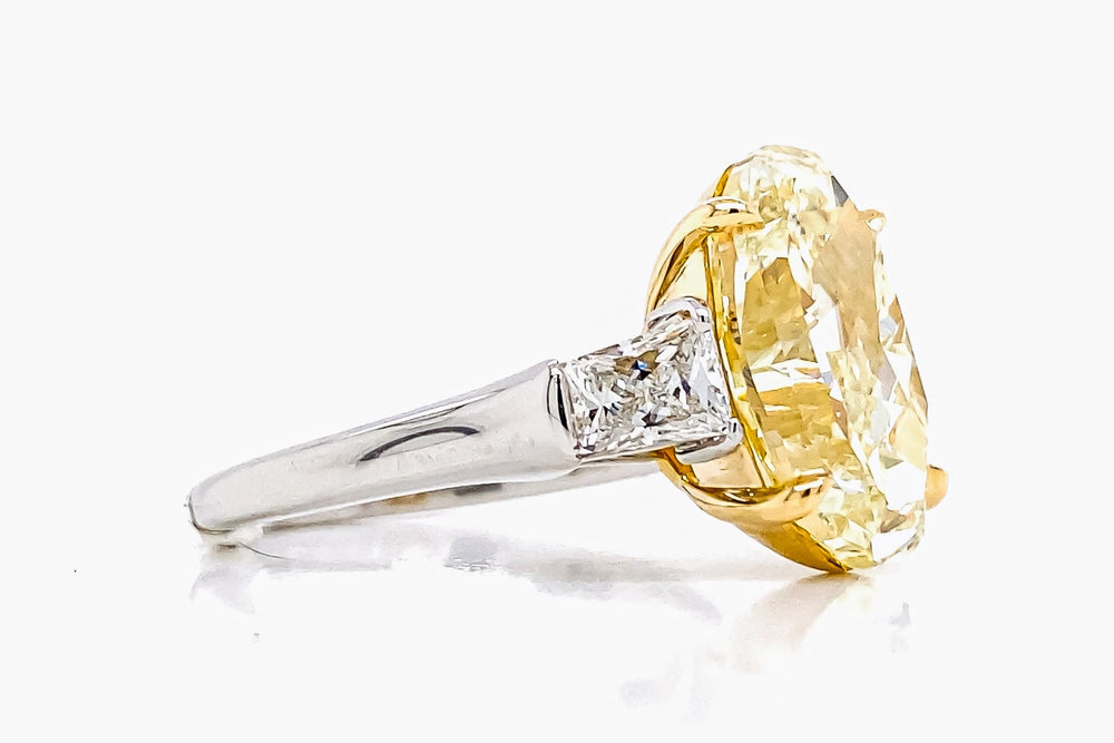GIA Certified 5.75 Carat Oval Fancy Yellow Diamond Ring