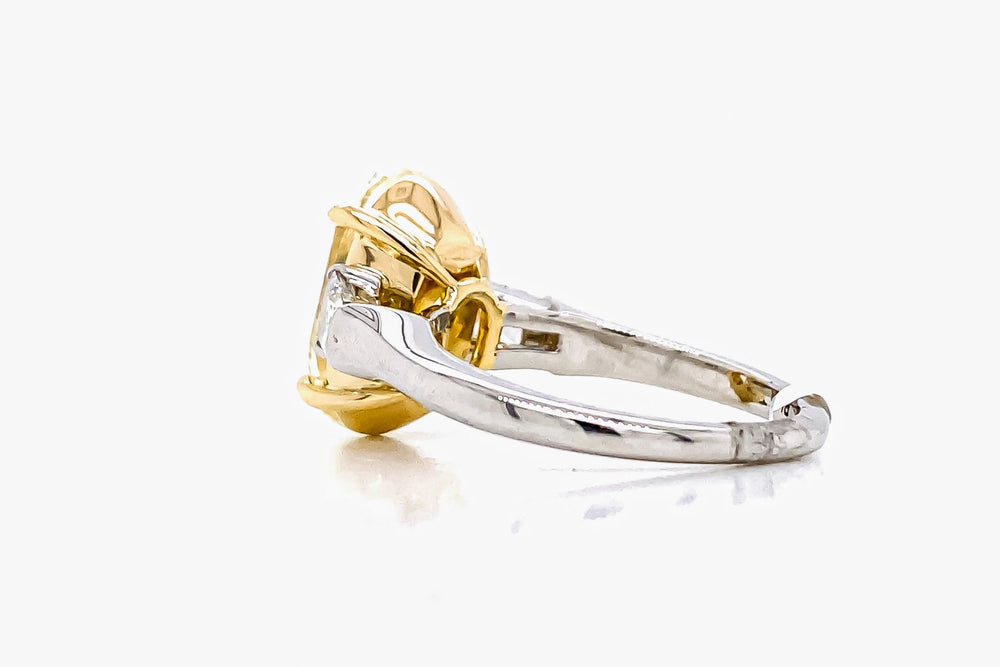 GIA Certified 5.75 Carat Oval Fancy Yellow Diamond Ring