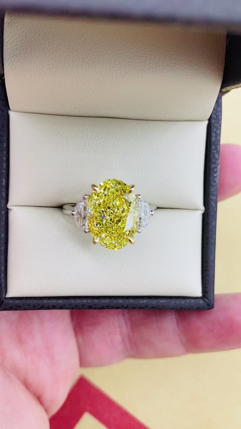 GIA Certified 7.00 Carat Oval Fancy Intense Yellow Diamond Ring