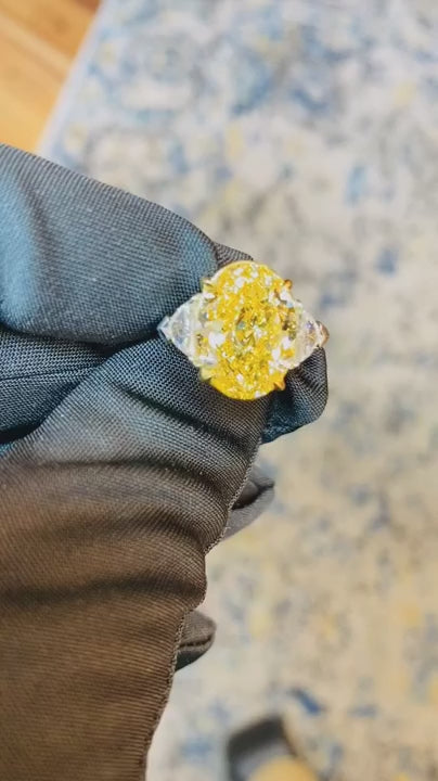 GIA Certified 8.00 Carat Oval Fancy Intense Yellow Diamond Ring